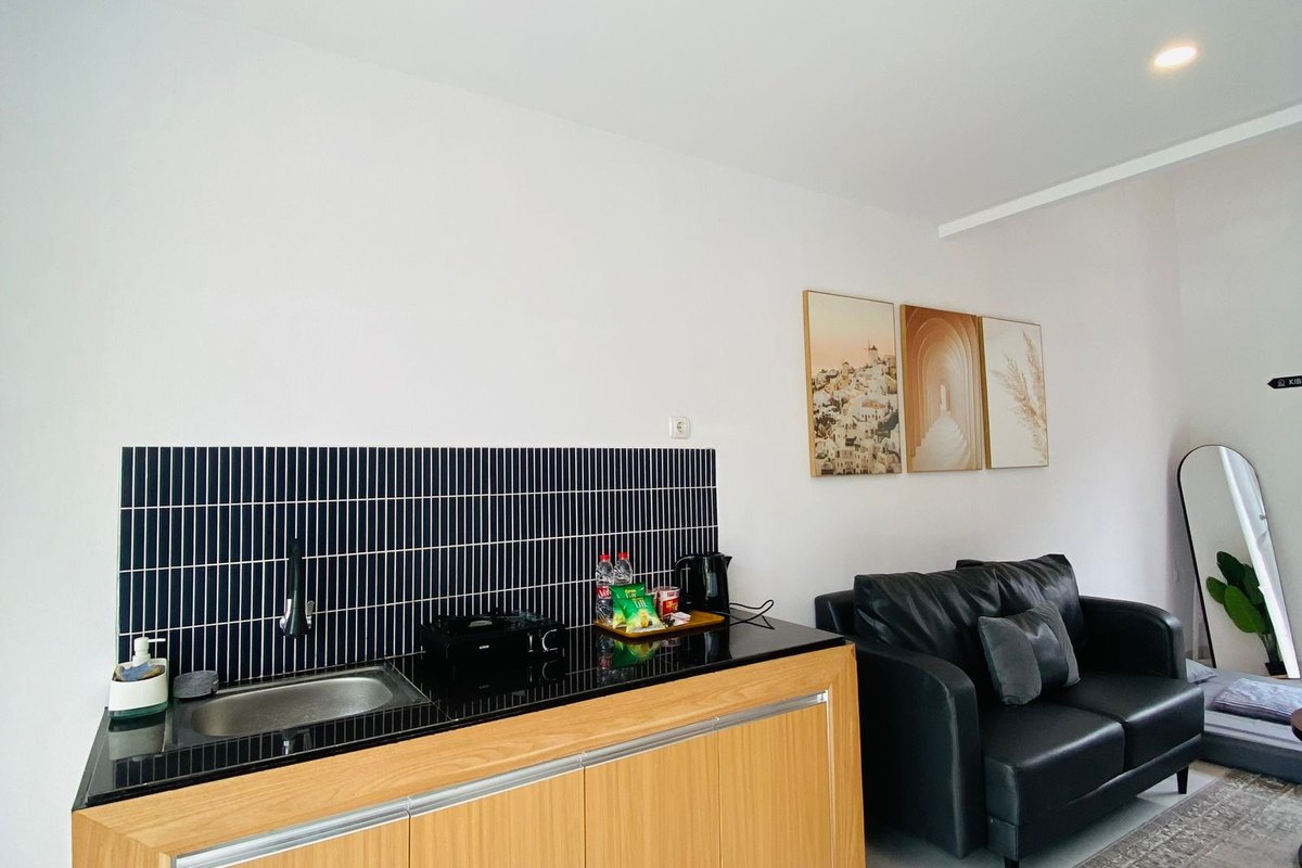 A kitchenette in a compact apartment-style living space