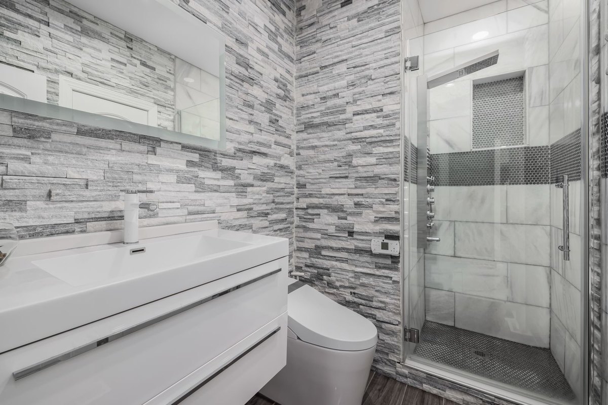 Bright remodeled bathroom with new vanity in Anchorage