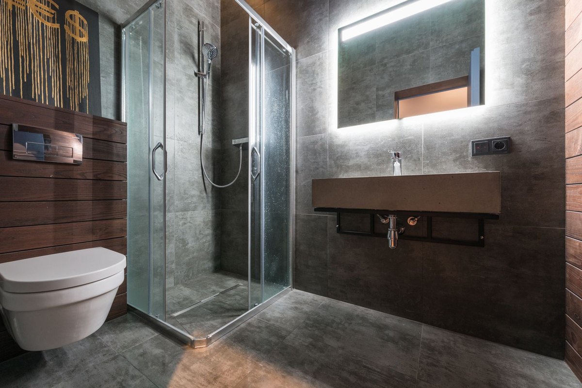 Tiled walk-in shower with glass enclosure in Anchorage
