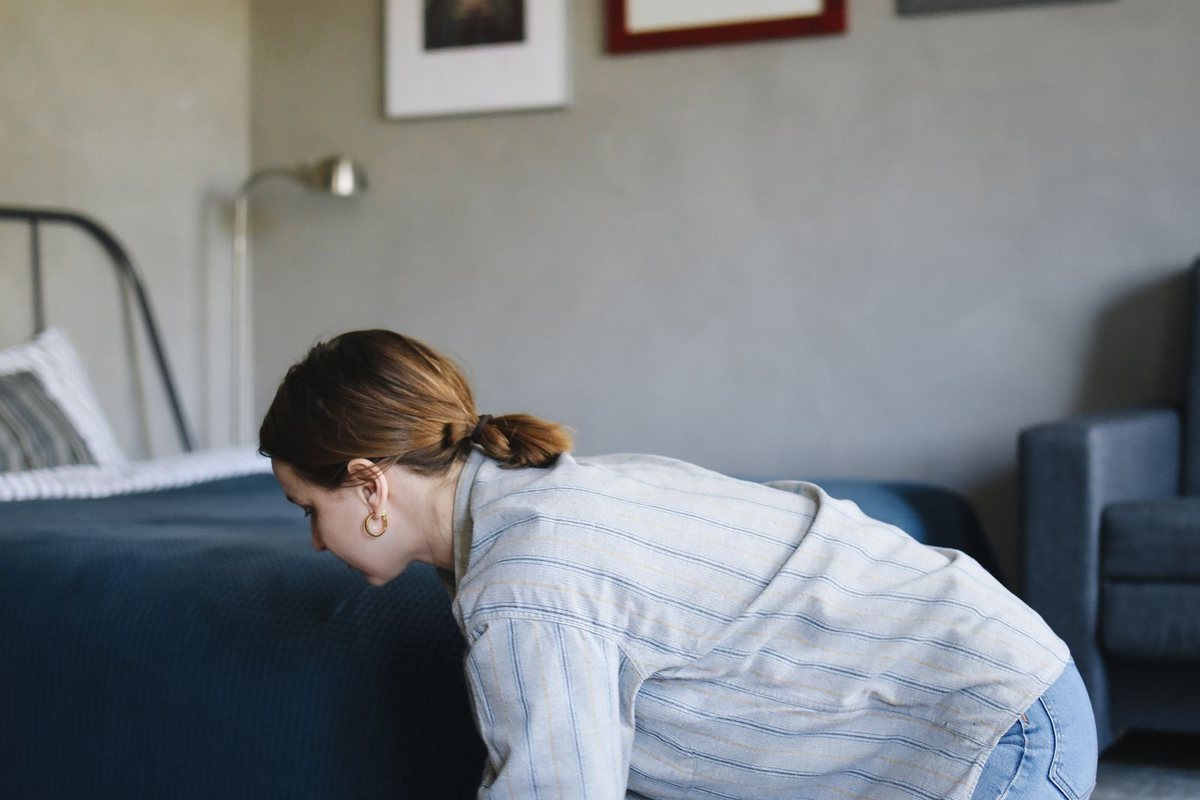 Spot-cleaning a carpet by hand in a Anchorage, AK home