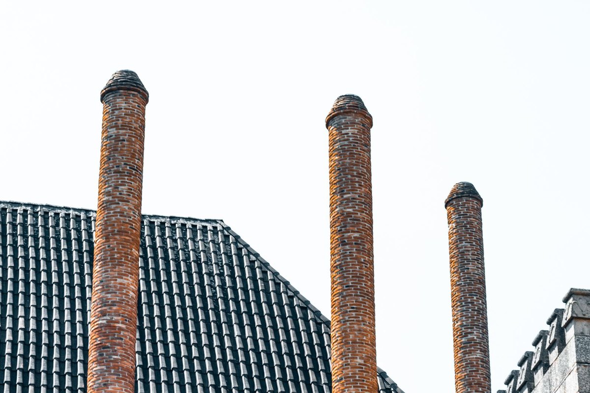 Close-up of a brick chimney showing masonry and mortar joints in Anchorage