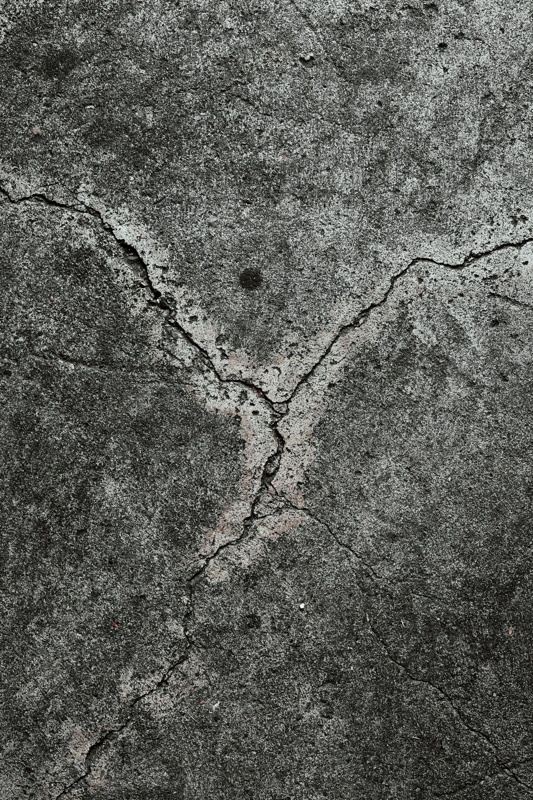 Cracked concrete driveway being repaired in Anchorage, AK