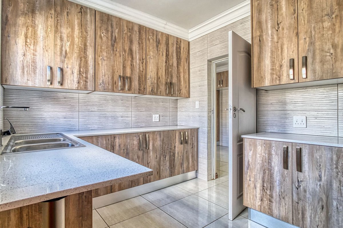 White quartz countertop with waterfall island in Anchorage, AK