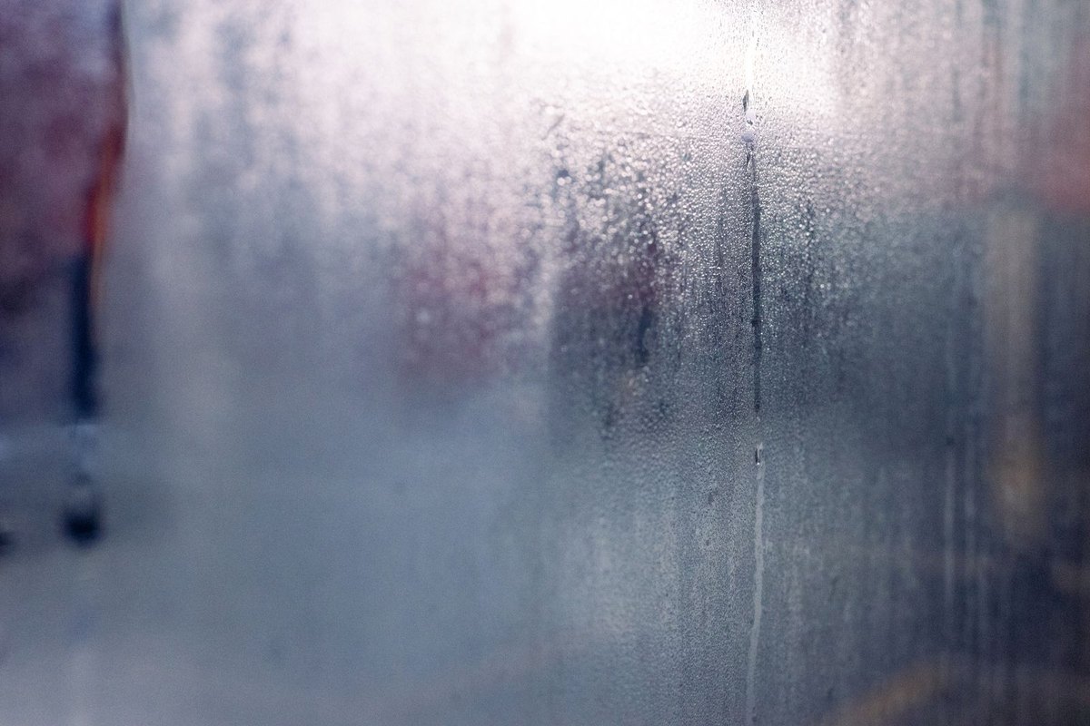 Condensation and moisture droplets forming on a window