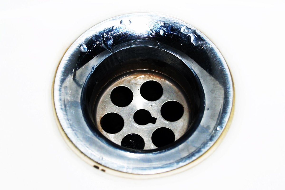 A clean stainless steel sink drain in Anchorage
