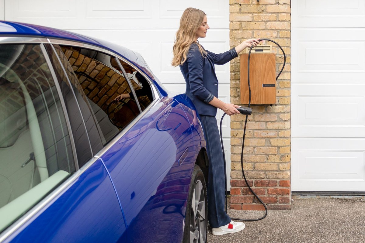 Electric vehicle plugged in and charging at a Anchorage home