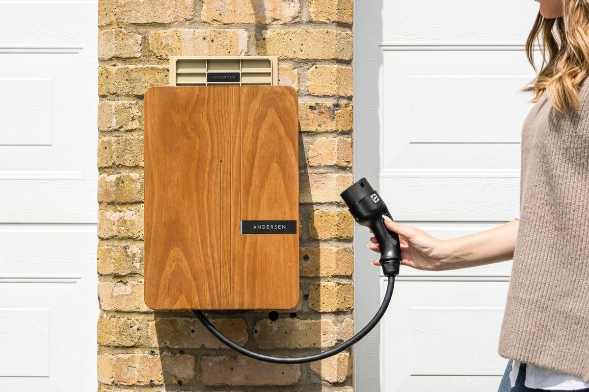 Wall-mounted Level 2 EV charger installed in a Anchorage, AK garage