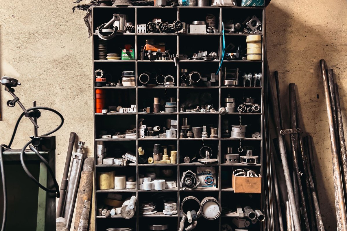Garage shelving holding neatly organized tools and parts