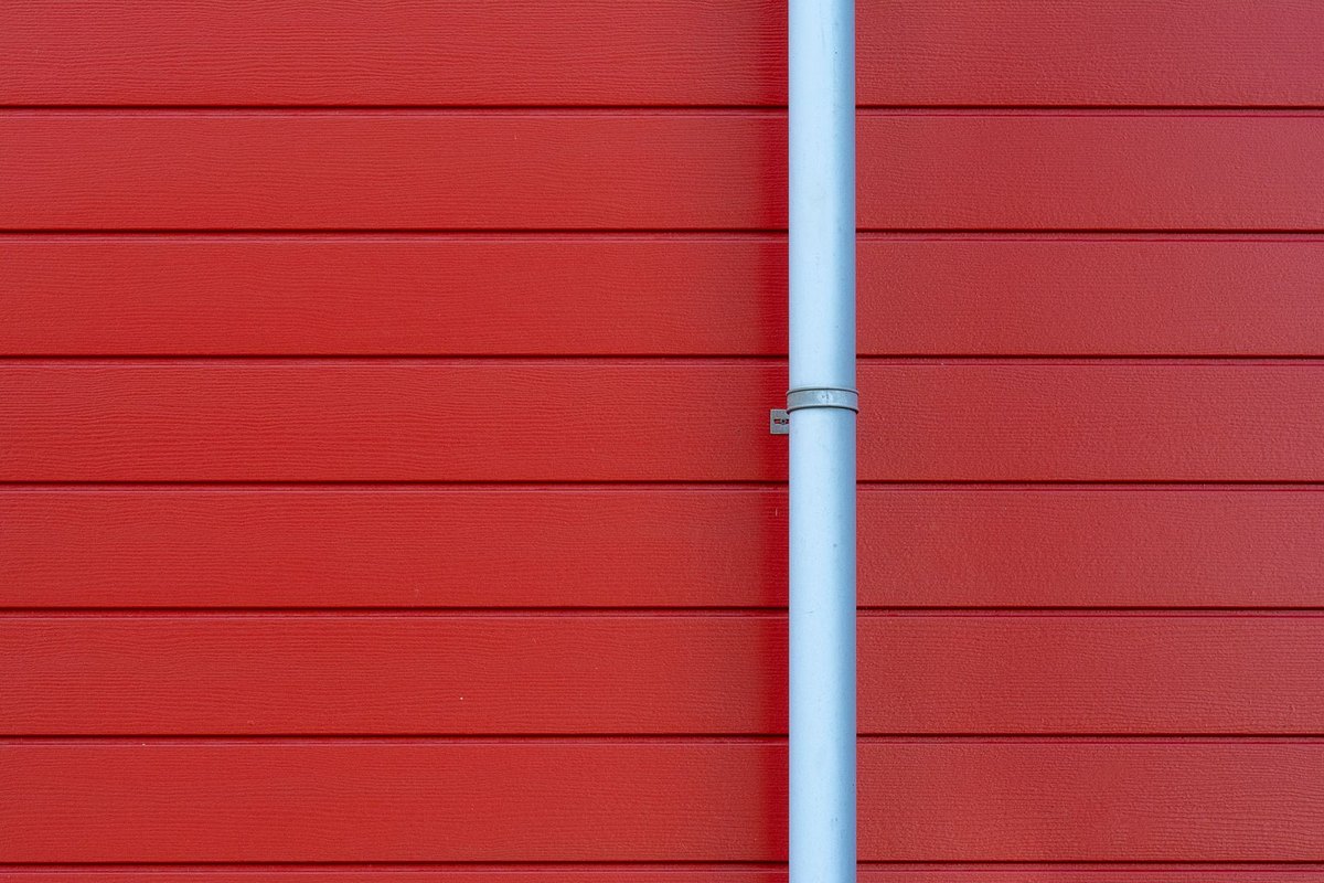 Downspout running down the side of a home