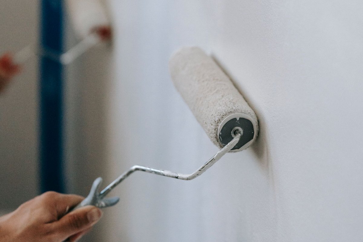 Painting an interior wall with a roller