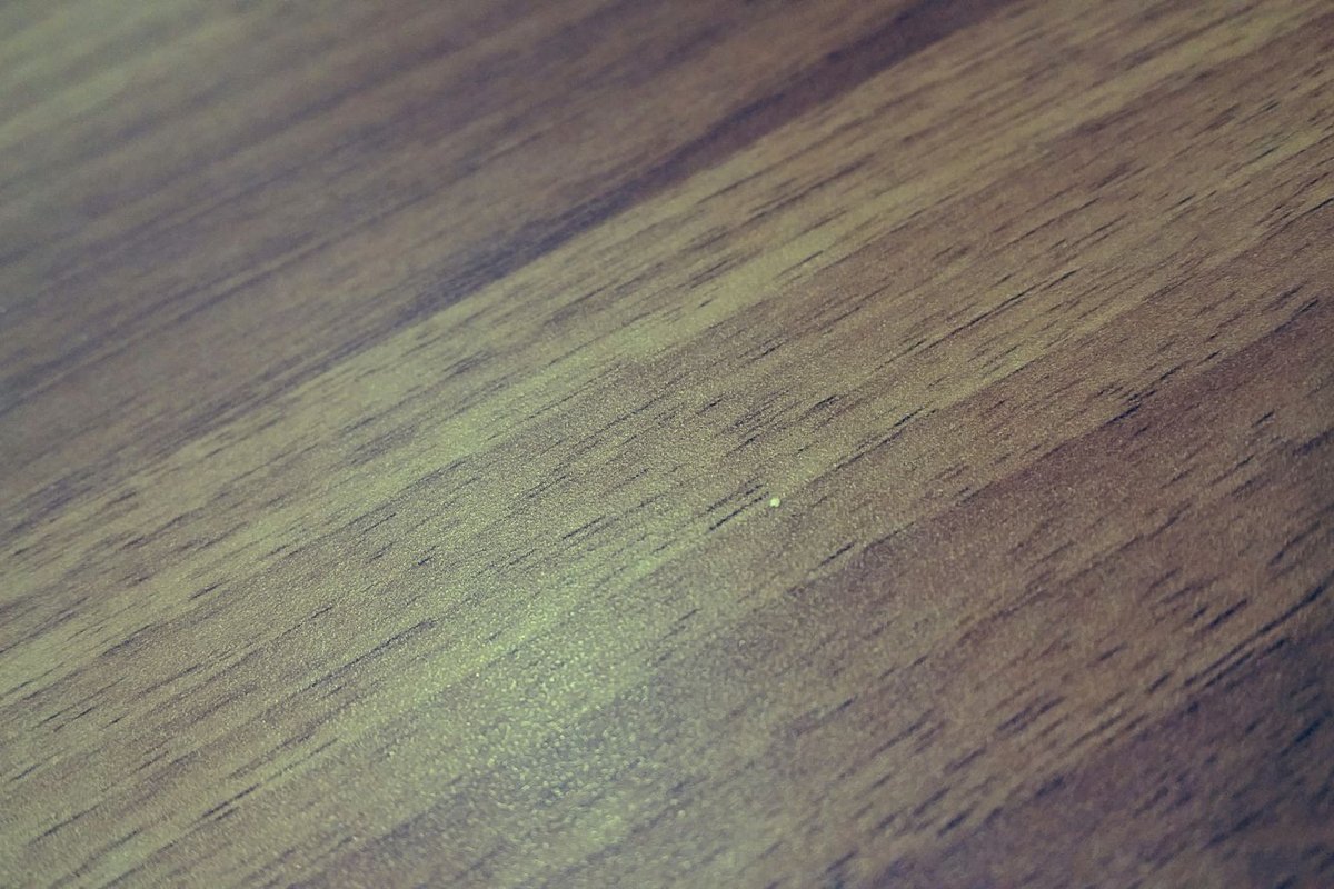 Close-up of a polished hardwood floor with a glossy sheen