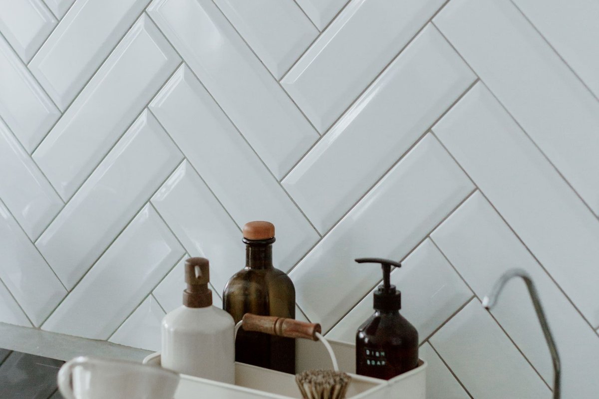 Clean tiled counter with cleaning products in a Anchorage, AK home