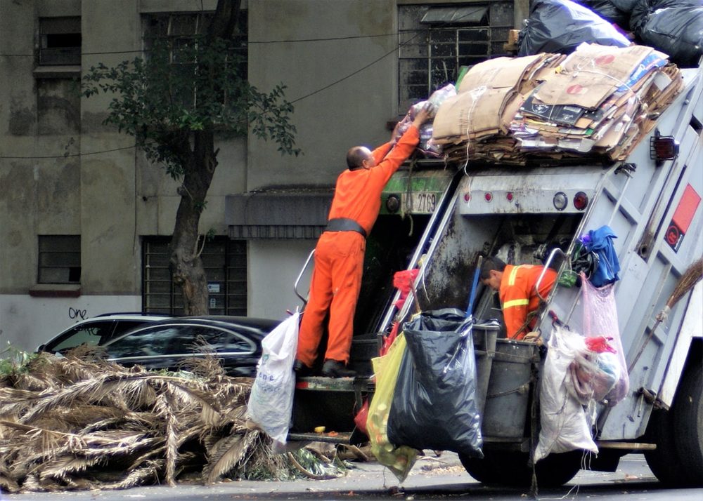 Crew loading junk onto the truck in Anchorage