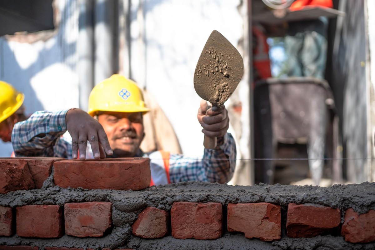 Brick repair work replacing damaged brick in a Anchorage wall
