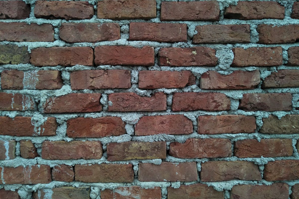 Repaired brick wall with clean, matched mortar joints in Anchorage, AK