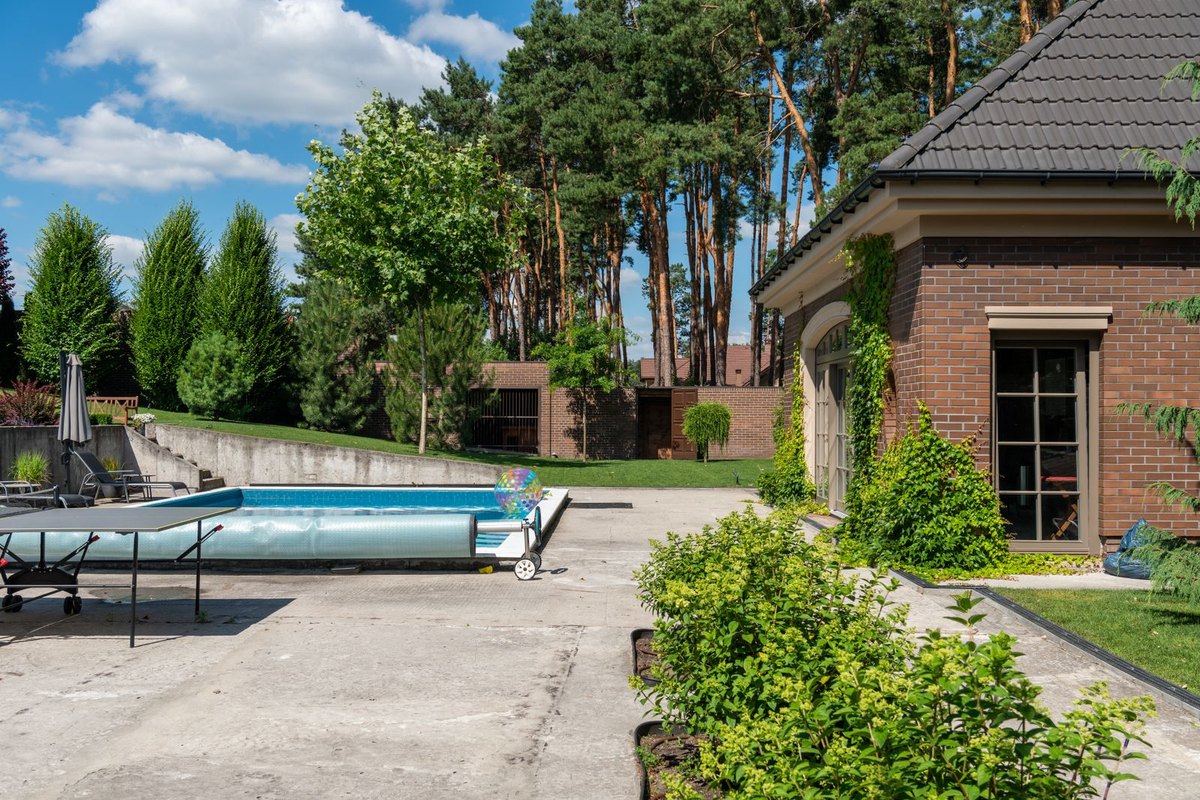 A clean residential backyard pool in Anchorage, AK