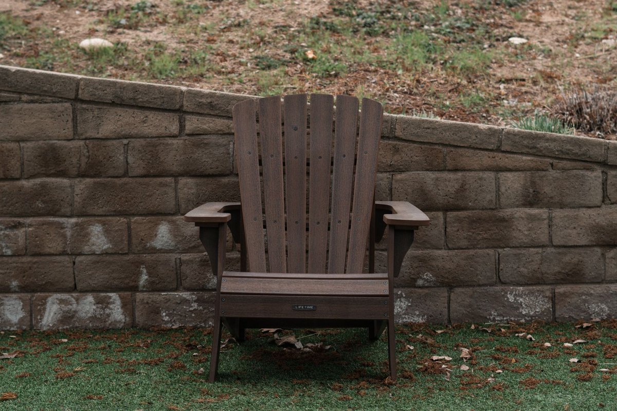 Stone retaining wall in a landscaped yard in Anchorage, AK
