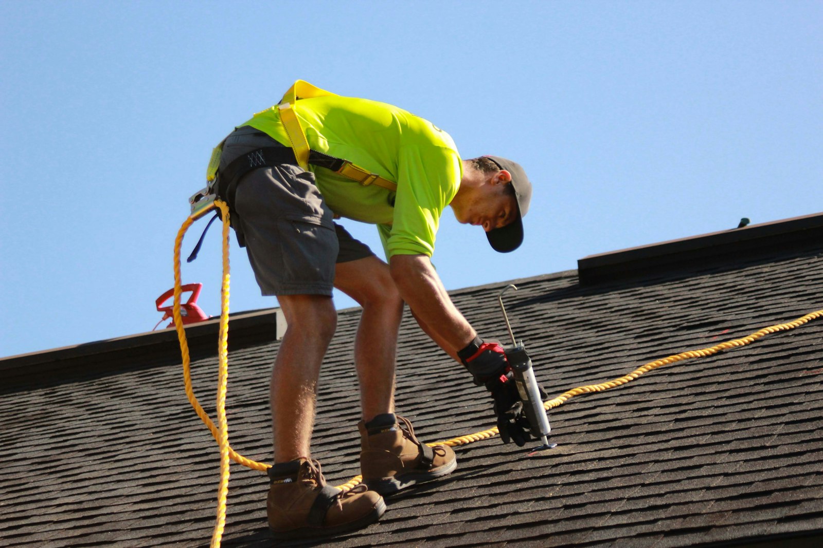 Roofing crew installing a new roof in Anchorage