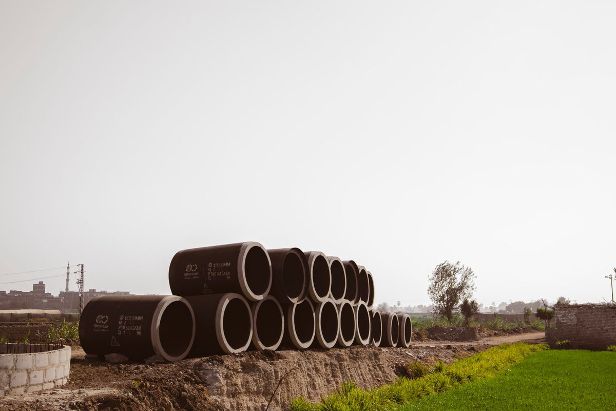 Stacked pipe sections, representing the new pipe trenchless lining and bursting place underground