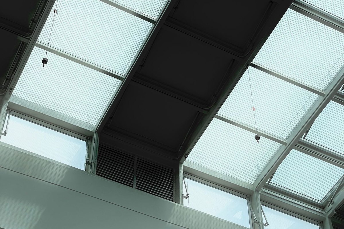 Skylight set into a sloped ceiling letting in daylight