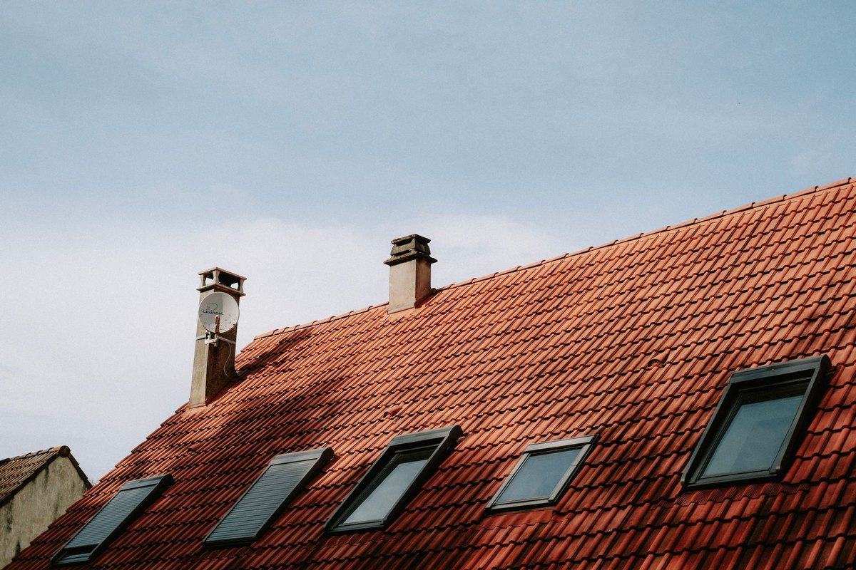 Skylights set into a pitched residential roof in Anchorage