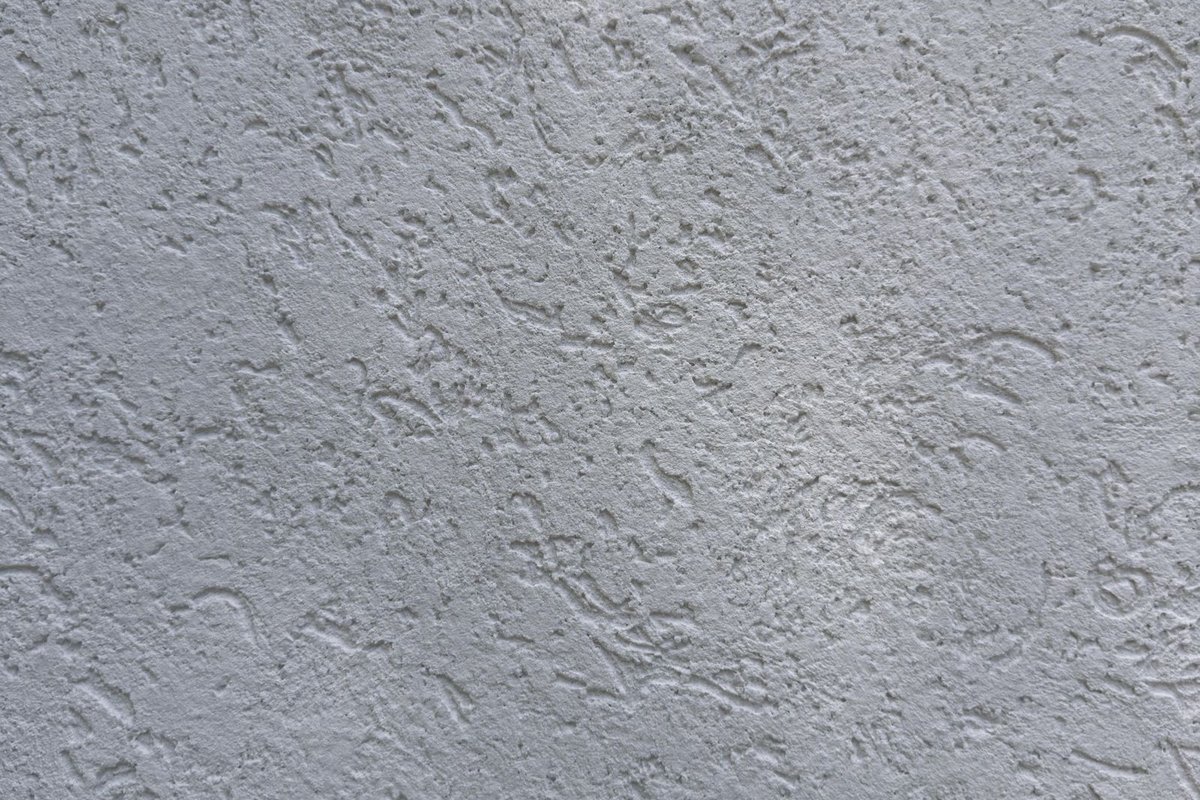 Freshly replastered stucco exterior wall in Anchorage, AK