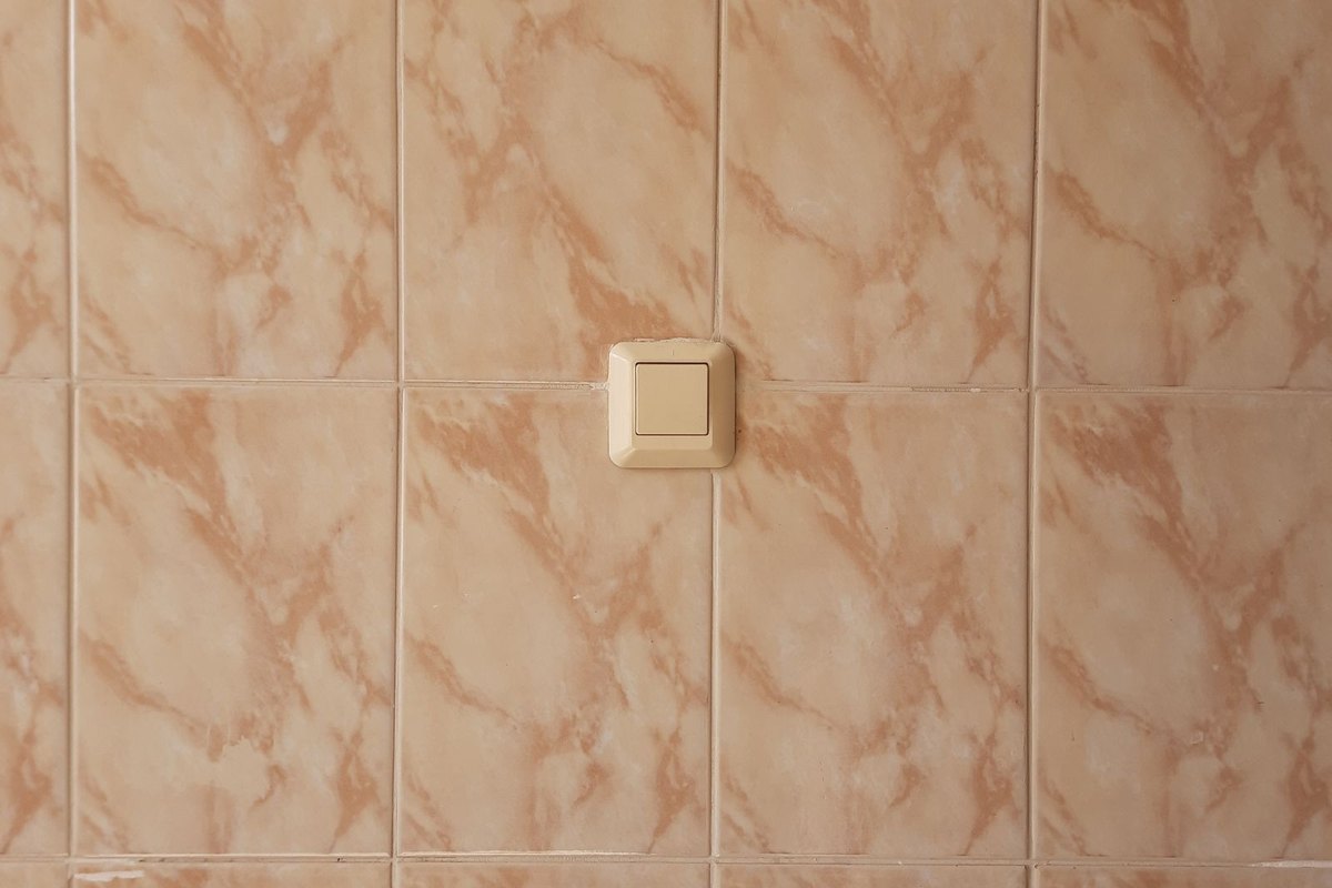 Close-up of ceramic wall tile and grout lines in a Anchorage, AK home