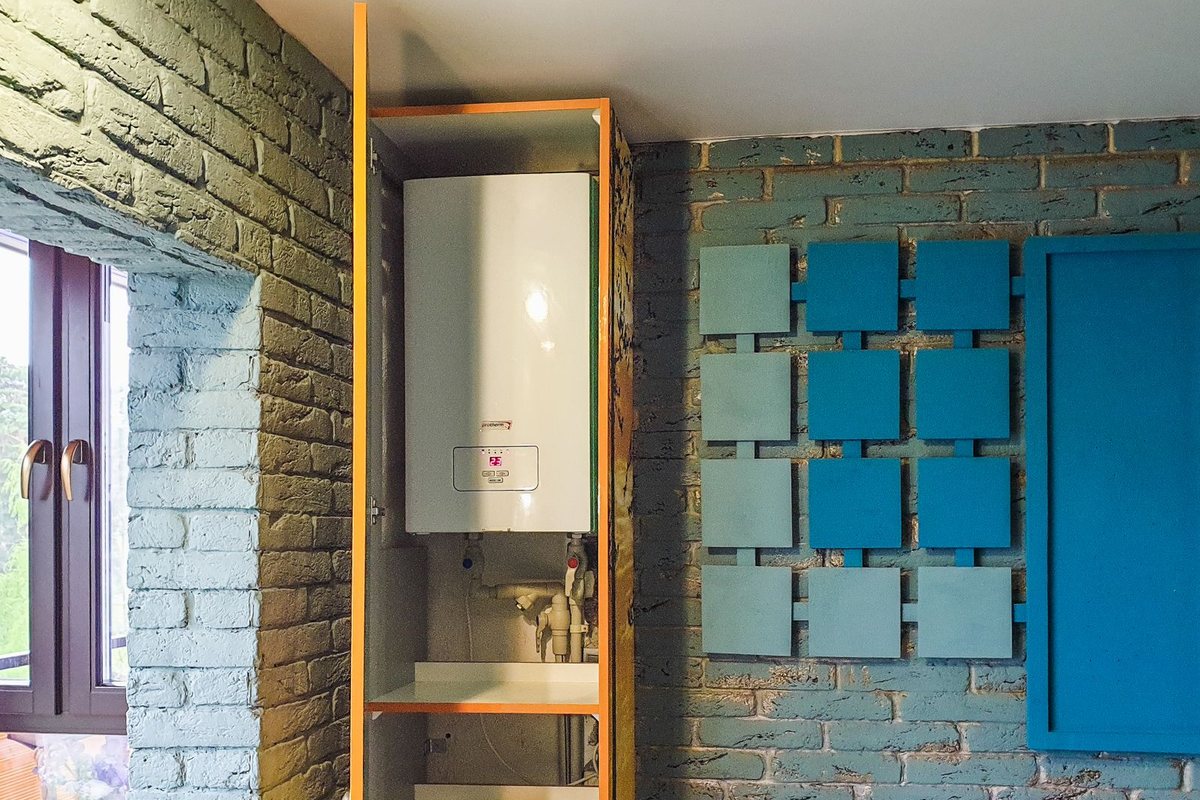 Wall-mounted water heater unit installed in Anchorage, AK