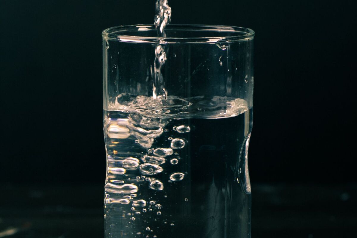 Clear glass of filtered drinking water